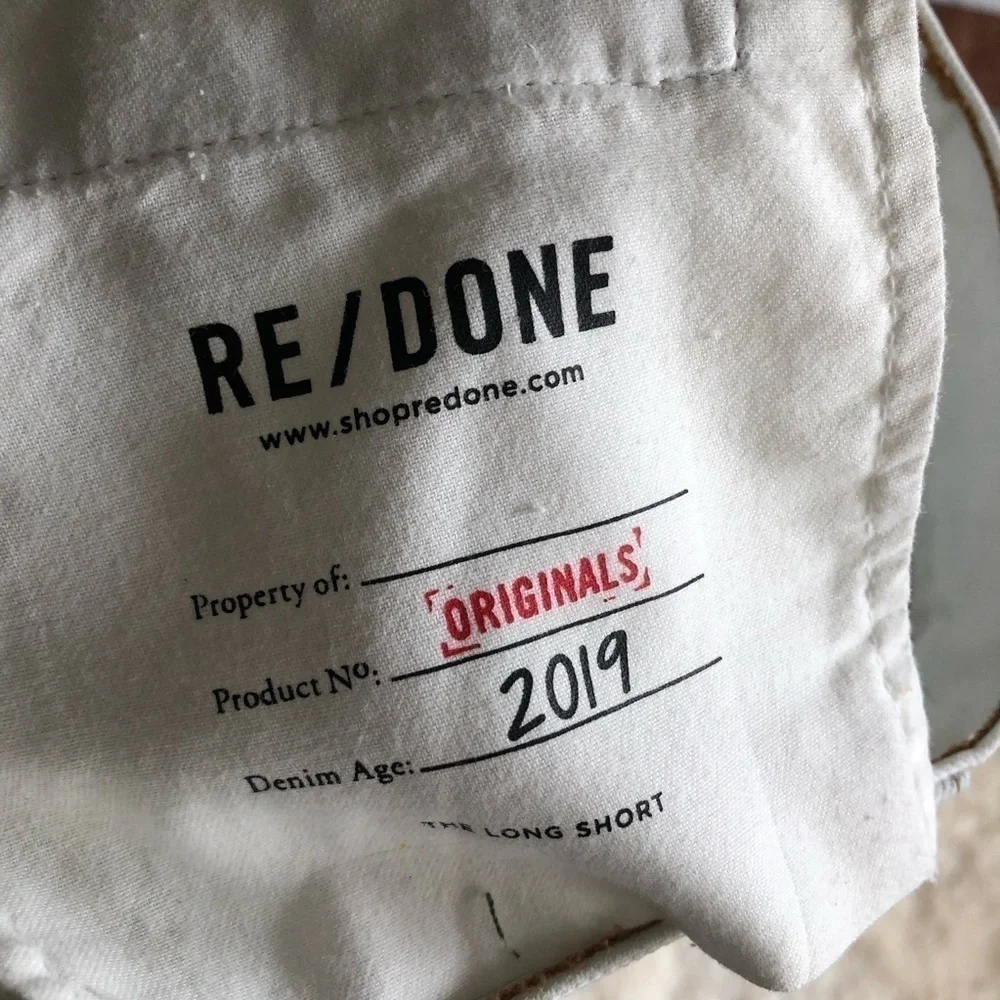 Re/Done The 80’s Long Short Raw Hem Bleach White Denim 25